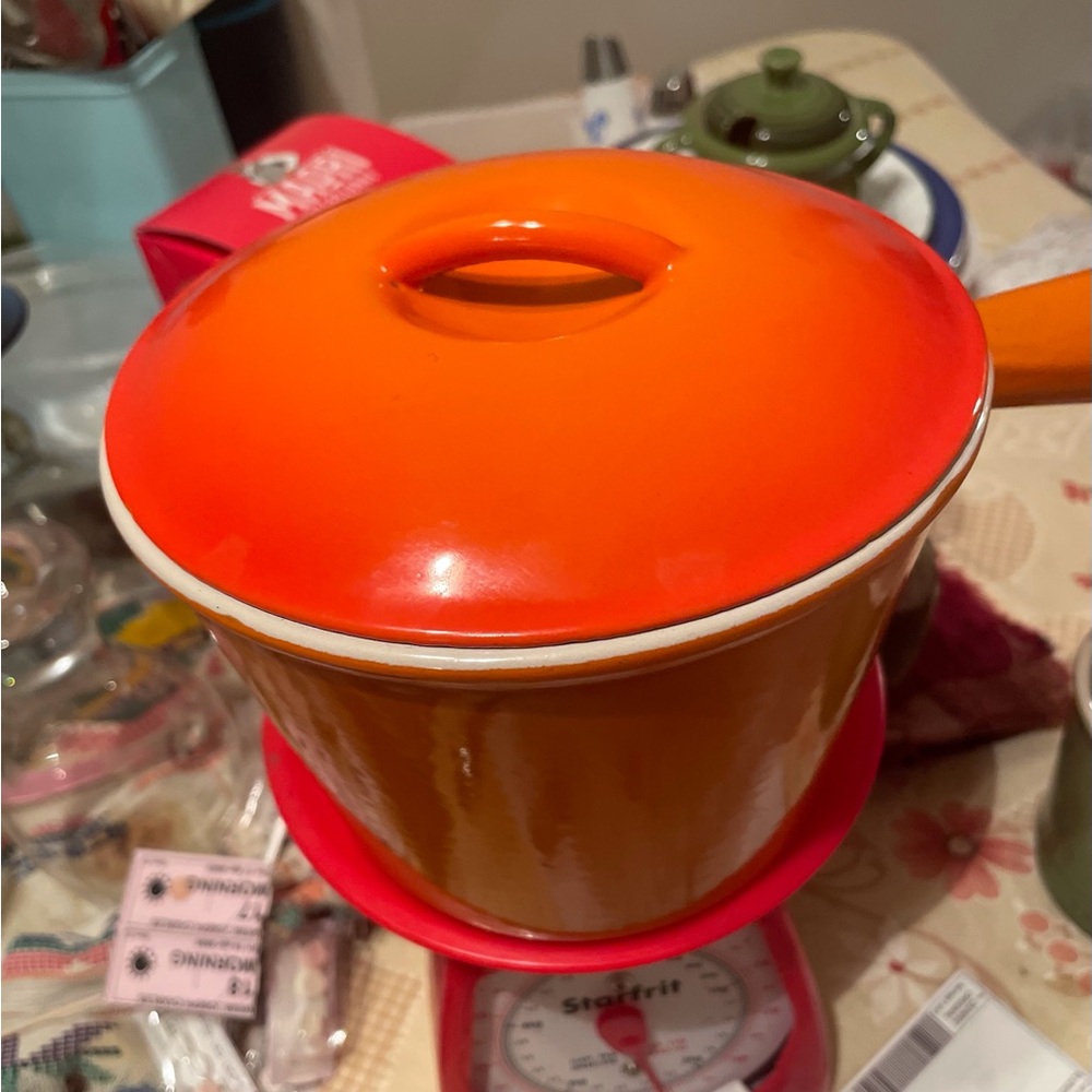 Le Creuset Heavy Enamelled Cast Iron Orange Fondue Pot with lid, made in France.
